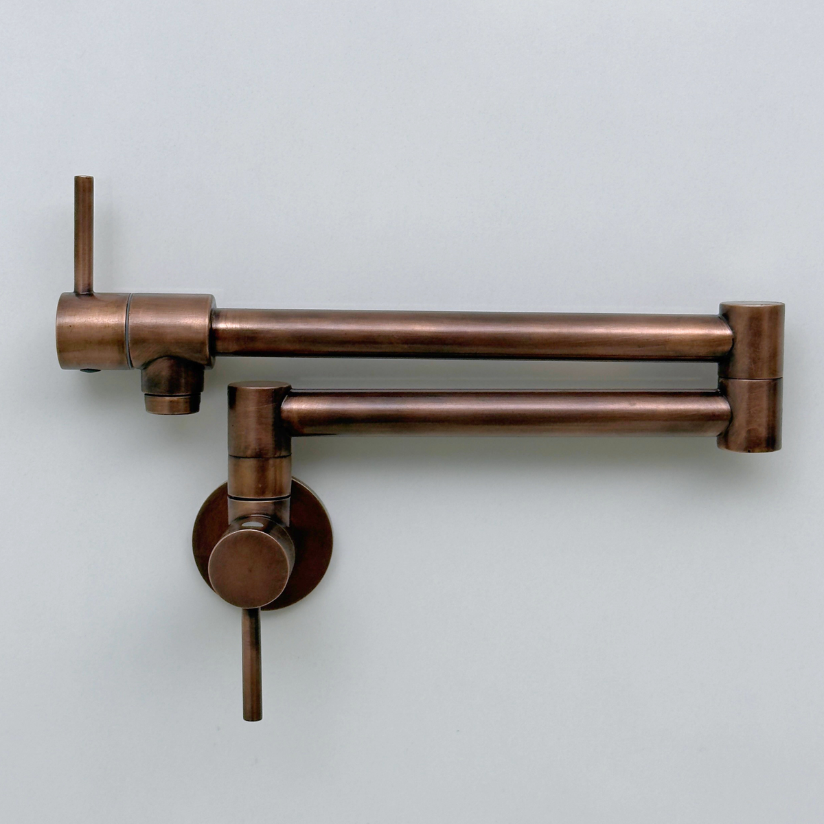 Antique copper pot filler showing the warm aged copper finish