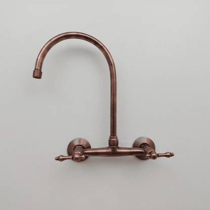 Grifo de pared de latón con acabado en cobre antiguo y manijas tipo palanca - Ref. WFL005