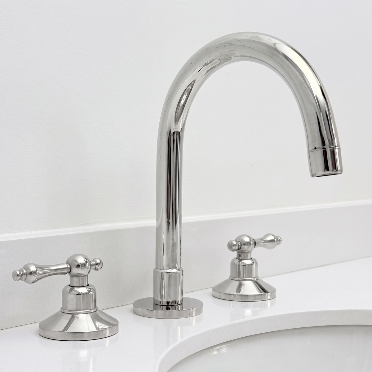 Polished Nickel Widespread Bathroom Faucet with Lever Handles